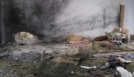 This handout photograph released by the official Syrian Arab News Agency (SANA) on December 26, 2025, shows the aftermath of the explosion inside Imam Ali ibn Abi Talib Mosque in the Wadi al-Dahab neighborhood of Homs. A deadly explosion hit a mosque in a predominantly Alawite area of Syria's Homs on December 26, said authorities who reported at least six people killed. (Photo by HANDOUT / SANA / AFP