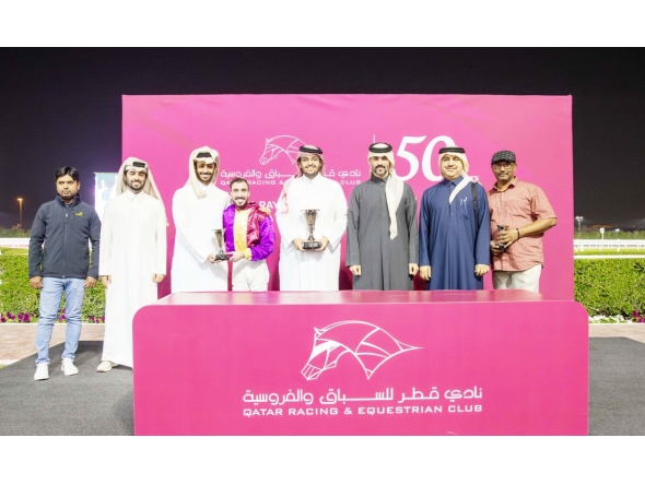 The connections of Hadi De Carrere pose with their trophies. Head of QREC Racing Operations Section Rashid Saed Adiba crowned the winners. PICS: Juhaim/QREC
