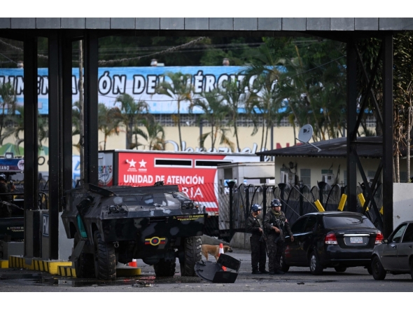Members of the National Guard stand guard at Fuerte Tiuna, Venezuela's largest military complex, in Caracas on January 3, 2026. (Photo by Federico Parra / AFP)