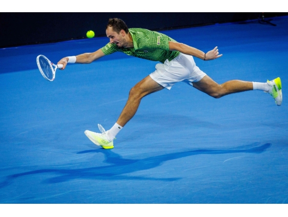 Daniil Medvedev of Russia hits a return during his men's singles final against Brandon Nakashima of the US at the Brisbane International tennis tournament in Brisbane on January 11, 2026. (Photo by Patrick Hamilton / AFP)