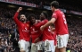 Manchester United's Danish defender #13 Patrick Dorgu (2L) celebrates with teammates after scoring their second goal during the English Premier League football match between Manchester United and Manchester City at Old Trafford in Manchester, north west England, on January 17, 2026. (Photo by Darren Staples / AFP) 