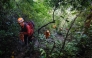 Joint search and rescue teams climb towards the suspected crash site of an Indonesia Air Transport turboprop plane that lost contact a day earlier while flying from Yogyakarta to Makassar, in the Bulusaraung Mountains, South Sulawesi, Indonesia, January 18, 2026. Photo by Muchtamir / AFP