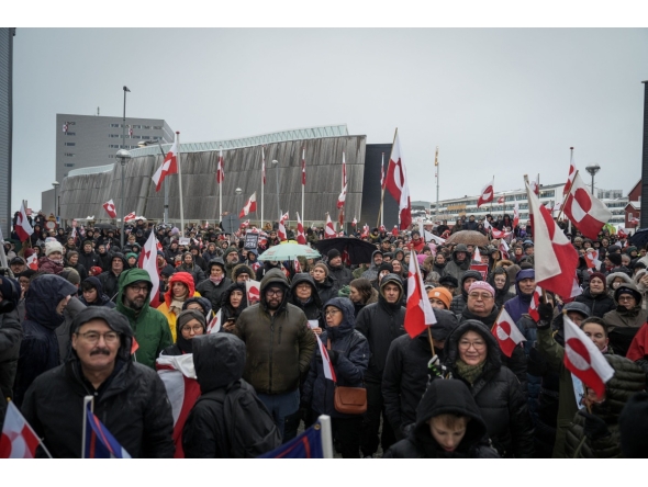 Photo for representation only. People take part in a demonstration that gathered almost a third of the city population to protest against the US President's plans to take Greenland, on January 17, 2026 in Nuuk, Greenland. (Photo by Alessandro RAMPAZZO / AFP)
