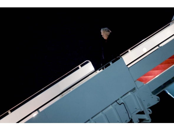 US President Donald Trump walks off Air Force One on January 19, 2026 in Joint Base Andrews, Maryland. Anna Moneymaker/Getty Images/AFP