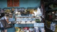 Rice prices are displayed at a market stall Quezon City, Metro Manila, the Philippines, on Saturday, April 6, 2024. (Photo by Veejay Villafranca/Bloomberg)