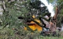  A picture taken on January 28, 2026 shows tree branches fallen on a kiosk in Lisbon after storm Kristin hit Portugal. (Photo by Thomas CABRAL / AFP)