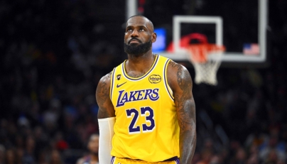 LeBron James #23 of the Los Angeles Lakers reacts during the fourth quarter against the Cleveland Cavaliers at Rocket Arena on January 28, 2026 in Cleveland, Ohio. Jason Miller/Getty Images/AFP 