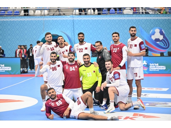 File photo of Qatar players celebrate after qualifying for the semi-final.