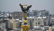 This photograph shows the Independence Monument towering over the Independence Square in Kyiv on February 6, 2026. (Photo by Genya Savilov / AFP)
