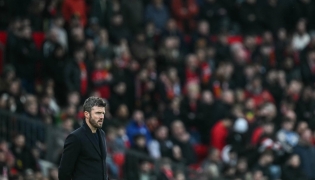 Manchester United's English interim head coach Michael Carrick looks on during the English Premier League football match between Manchester United and Fulham at Old Trafford in Manchester, north west England, on February 1, 2026. (Photo by Paul ELLIS / AFP)