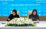 NHRC Chairperson H E Mariam bint Abdullah Al Attiyah and President of the Saudi Human Rights Commission H E Dr. Hala bint Mazyad Al Tuwaijri signing the agreement.