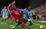 Manchester City's Ghanaian midfielder #42 Antoine Semenyo (R) fouls Liverpool's French defender #05 Ibrahima Konate (front L) which results in a free kick during the English Premier League football match between Liverpool and Manchester City at Anfield in Liverpool, on February 8, 2026. (Photo by Paul ELLIS / AFP)