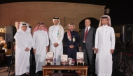 Director General of the Katara Cultural Village Foundation Professor Dr. Khalid bin Ibrahim Al-Sulaiti (third right) with others during the launch of the book yesterday.