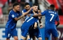 Al Duhail players celebrate the equaliser.