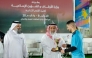 Minister of Awqaf and Islamic Affairs H E Ghanem bin Shaheen bin Ghanem Al Ghanem honouring a winner at the event.