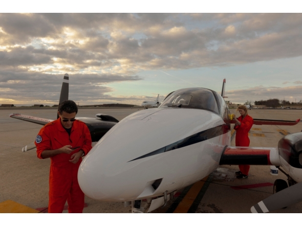 The crew of the Humanitarian Pilot Initiative (HPI) flight gets ready to the takeoff in Las Palmas on January 23, 2026. (Photos by Michele Cattani / AFP)