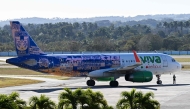 A Viva Aerobus plane plane takes taxis at Jose Marti International Airport in Havana on February 9, 2026. (Photo by YAMIL LAGE / AFP)
