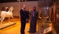 This handout picture taken on February 9, 2026 provided by the Saudi Press Agency (SPA) shows Saudi Arabia Crown Prince and Prime Minister HRH Prince Mohammad bin Salman bin AbdulAziz Al Saud meeting with Britain's Prince William, Prince of Wales in the old district of Diriyah on the outskirts of the Saudi capital Riyadh. (Photo by SPA / AFP)