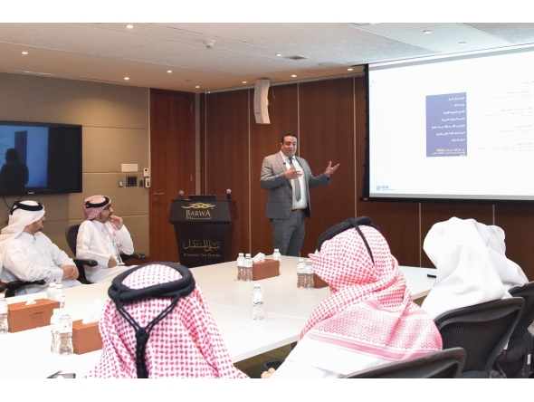 Participants attend an investment awareness workshop.