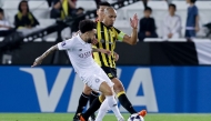 Action during match between Al Sadd and Al Ittihad.