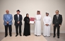 QICCA Vice Chairman Sheikh Dr. Thani bin Ali Al Thani presenting a cerificate to one of the trainees in the presence of other officials.