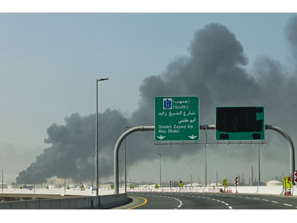 A plume of smoke rises from the port of Jebel Ali following a reported Iranian strike in Dubai on March 1, 2026. (Photo by Fadel Senna / AFP)