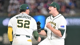 Australia's closing pitcher Jon Kennedy (R) celebrates victory over Taiwan at the World Baseball Classic (WBC) Pool C first round game between Australia and Taiwan at the Tokyo Dome on March 5, 2026. (Photo by Kazuhiro Nogi/ AFP) 
