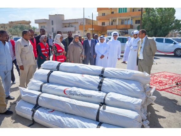 Ambassador of Qatar to Sudan H E Mohamed bin Ibrahim Al-Sada with other officials at the distribution centre of shelter tents.