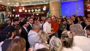 Ambassador of Georgia H E Varlam Avaliani with Georgian citizens who were repatriated. 