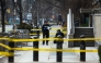 Toronto Police officers work around the scene of a shooting at the US Consulate in Toronto, Canada, on March 10, 2026. (Photo by Cole BURSTON / AFP)
