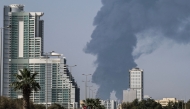 Smoke rises from the direction of an energy installation in the Gulf emirate of Fujairah on March 14, 2026. (Photo by AFP) 