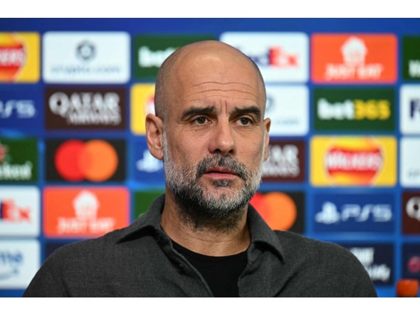 Manchester City's Spanish manager Pep Guardiola looks on during a press conference at the Etihad Campus training ground in Manchester, north-west England, on March 16, 2026, on the eve of their UEFA Champions League, Last 16, second-leg football match against Real Madrid. (Photo by Paul ELLIS / AFP)