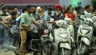People rush to refuel their vehicles at a fuel station in Amritsar on March 26, 2026 following import disruptions caused by the Middle East conflict. Photo by Narinder NANU / AFP