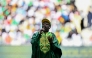 Sengalese musician Youssou N'Dour performs ahead of the international friendly football match between Senegal and Peru at the Stade de France in Saint-Denis, north of Paris on March 28, 2026. (Photo by Julien De Rosa / AFP)