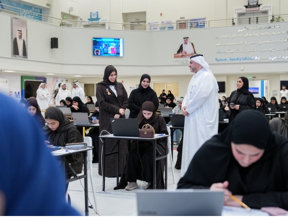 Minister of Education and Higher Education H E Lolwah bint Rashid bin Mohammed Al Khater inspects as students sit an admission test at Qatar Science and Technology School for Girls.