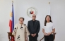In this handout photo taken April 1, 2026 and released by the Philippine Department of Foreign Affairs shows Philippine Secretary of Foreign Affairs Thereza Lazaro (L), Iranian Ambassador to the Philippines Yousef Esmaeilzadeh (C) and Philippine Secretary of Energy Sharon Garin posing for a photo during a bilateral meeting in Manila. (Photo by Handout / Philippine Department of Foreign Affairs / AFP) 