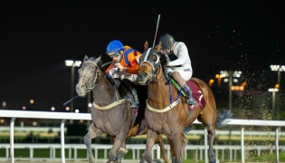 Marco Casamento  and Dubawi Spectre (left) on their way to win Al Jassasiya Cup ahead of Thor's Hammer, ridden by  Salem Alajmi. PIC: JUHAIM/QREC 