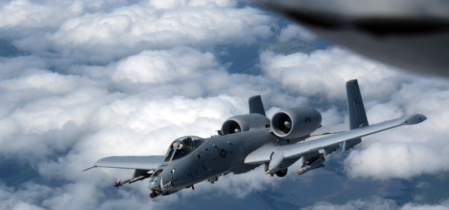 A US Air Force A-10 Thunderbolt II, also known as the Warthog, departs after receiving fuel in the skies near the border of Iowa and Missouri on July 7, 2020. (Photo by Senior Master Sgt. Vincent De Groot / US AIR FORCE / AFP) 