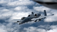 A US Air Force A-10 Thunderbolt II, also known as the Warthog, departs after receiving fuel in the skies near the border of Iowa and Missouri on July 7, 2020. (Photo by Senior Master Sgt. Vincent De Groot / US AIR FORCE / AFP) 