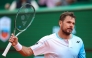 Switzerland's Stanislas Wawrinka reacts to a point against Argentinia's Sebastian Baez during the Monte Carlo ATP Masters Series Tournament round of 64 tennis match on Court Rainier III at the Monte-Carlo Country Club in Roquebrune-Cap-Martin, south-eastern France on April 6, 2026. (Photo by Valery HACHE / AFP)