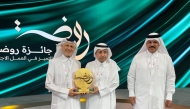 QCS officials with the award.
