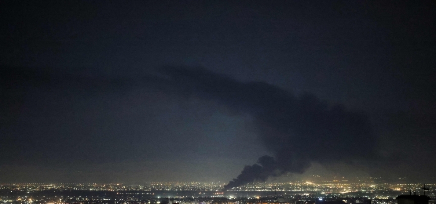 Smoke rises from the site of a US-Israeli strike on the Iranian capital Tehran on April 7, 2026. (Photo by Atta Kenare / AFP) 