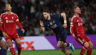 Paris Saint-Germain's Georgian forward #07 Khvicha Kvaratskhelia celebrates scoring his team's second goal during the UEFA Champions League quarter-final first leg football match between Paris Saint-Germain (PSG) and Liverpool FC at the Parc des Princes stadium in Paris on April 8, 2026. (Photo by Anne-Christine POUJOULAT / AFP)