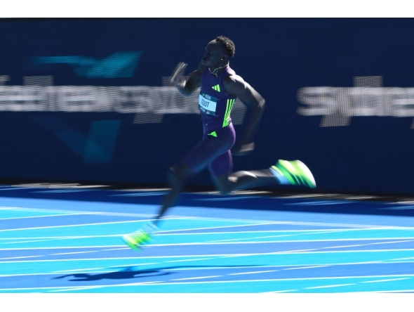 Australia's Gout Gout competes in the men's 200M heats at the Australian Athletics Championships in Sydney on April 12, 2026. (Photo by David Gray / AFP)