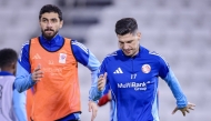 Al Shamal players take part in a training session.