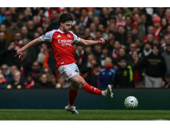 Arsenal's English midfielder #41 Declan Rice controls the ball during the English Premier League football match between Arsenal and Bournemouth at the Emirates Stadium in London on April 11, 2026. (Photo by Glyn KIRK / AFP)