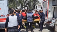 This handout photograph taken and released on April 15, 2026 by Turkish news agency DHA (Demiroren News Agency) shows first aid officers carrying a body bag in Kahramanmaras, southern Turkiye. Photo by HANDOUT / DHA (Demiroren News Agency) / AFP