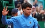 Spain's Carlos Alcaraz gestures after the Monte Carlo ATP Masters Series Tournament final tennis match against Italy's Jannik Sinner on Court Rainier III at the Monte-Carlo Country Club in Roquebrune-Cap-Martin, south-eastern France on April 12, 2026. (Photo by Valery HACHE / AFP)

