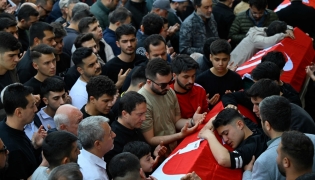 Family members and mourners attend the funerals for nine victims killed in a school shooting at the Abdulhamid Han Mosque in the southern province of Kahramanmaras on April 16, 2026. (Photo by Yasin Akgul / AFP)