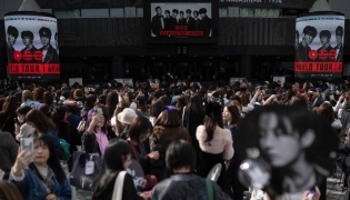 Fans of Korean boy band BTS arrive at Tokyo Dome before the start of the first BTS World Tour ‘Arirang’ in Tokyo on April 17, 2026. Photo by Andrew CABALLERO-REYNOLDS / AFP
